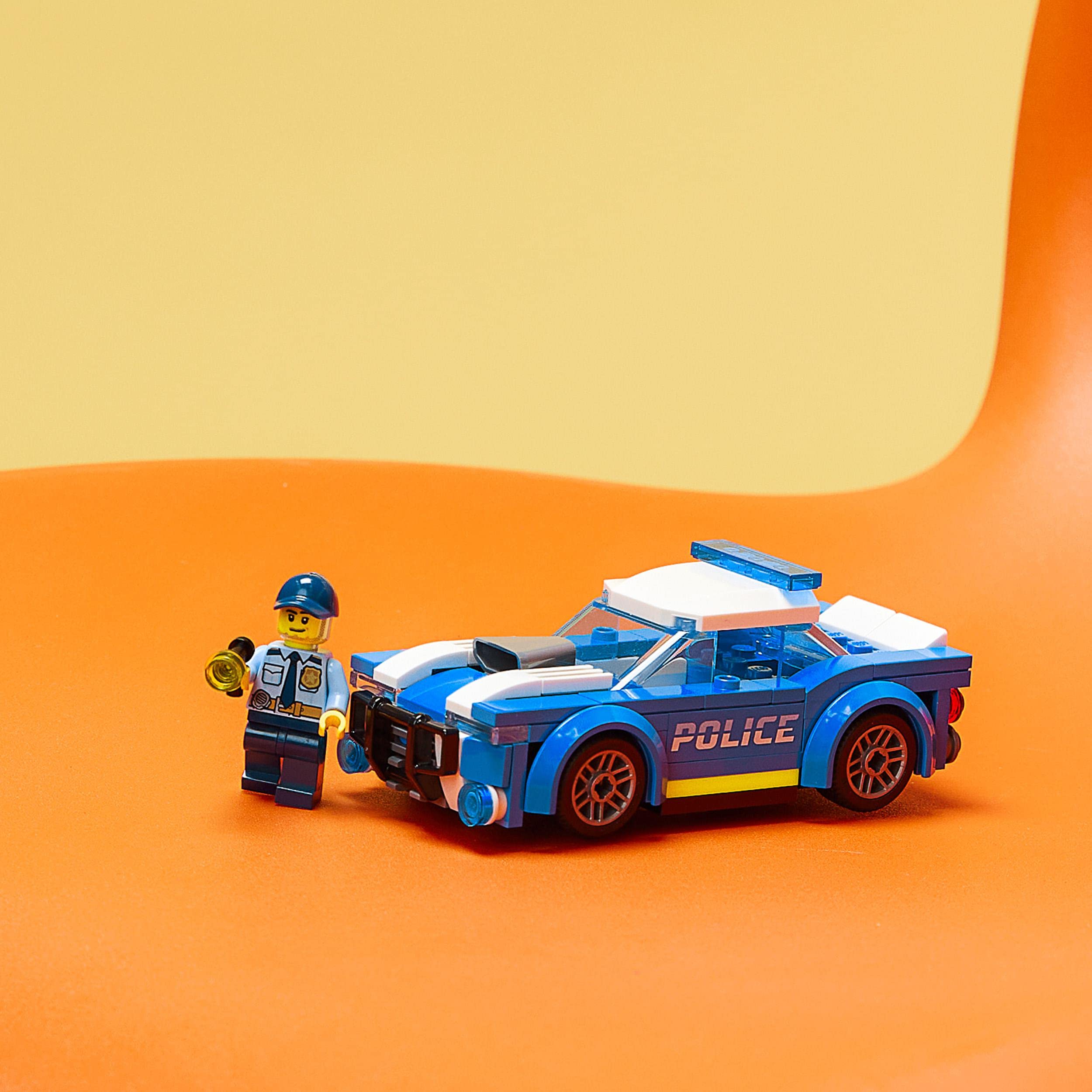LEGO 60312 City Polizeiauto, Polizei-Spielzeug ab 5 Jahren, Geschenk für Kinder mit Polizisten-Minifigur, Abenteuer-Serie, kreatives Kinderspielzeug